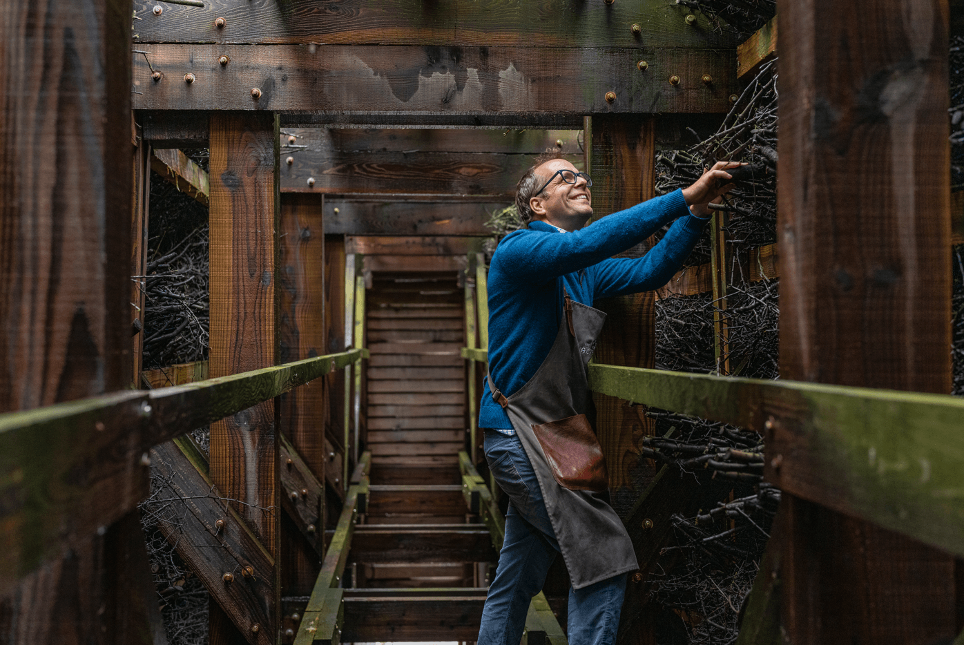 person standing beside a salt wall